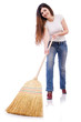 Young woman with broom isolated on white