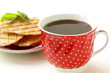 Foto: Red cup of coffee for breakfast Red cup of coffee for breakfast