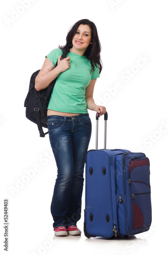 Photo: Young woman with suitcase isolated on white Young woman with suitcase isolated on white