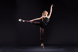 Photo : Ballerina dancing in the dark studio Ballerina dancing in the dark studio