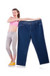 Woman in dieting concept with big jeans