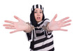 Prisoner in striped uniform on white