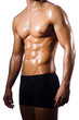 Muscular man isolated on the white