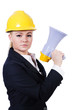 Female construction worker with loudspeaker