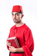 Young turk with book on white