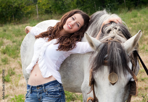 Photo: Beautiful woman with horse Beautiful woman with horse