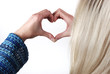 Foto: Woman making heart shape with her hands Woman making heart shape with her hands