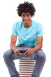Young black teenage men playing video games - African people