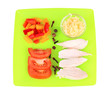 Preparing chicken stir fry with vegetables and spices