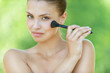 Girl with brush for makeup