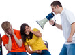 Young friends being yelled at by a bullhorn