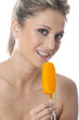 Model Released. Young Woman Eating Ice Lolly