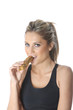 Foto: Model Released. Young Woman Eating Energy Cereal Bar Model Released. Young Woman Eating Energy Cereal Bar