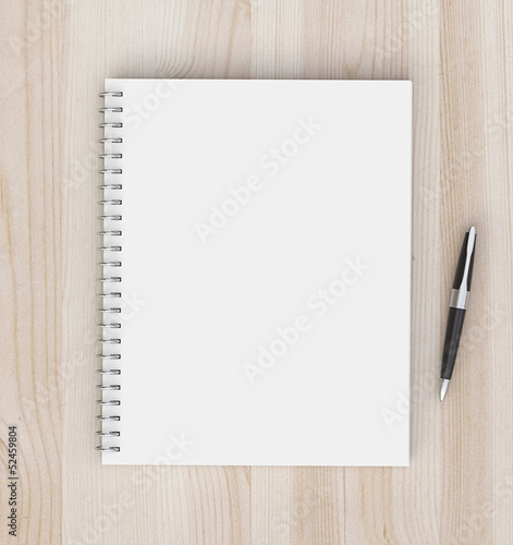 Photo: notebook and pen notebook and pen
