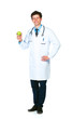 Portrait of a smiling male doctor holding green apple on white