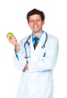 Portrait of a smiling male doctor holding green apple on white
