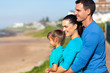 Photo: hapy family looking at sea view hapy family looking at sea view