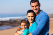 Photo: loving family at the beach loving family at the beach