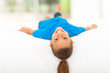 Photo: adorable little girl lying on bed adorable little girl lying on bed