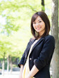 beautiful asian businesswoman in the park