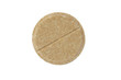 Brown pill close-up isolated on white background