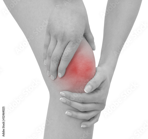 Photo: Acute pain in a woman knee Acute pain in a woman knee