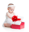Photo: baby girl opening gift box baby girl opening gift box