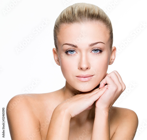 Photo: Beauty face of beautiful young woman - isolated Beauty face of beautiful young woman - isolated