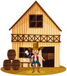 A man holding a gun near the barrels
