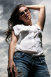 Beautiful woman over sky background