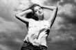 Beautiful woman over sky background