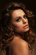 Beautiful woman with curls and makeup