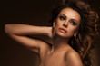 Beautiful woman with curls and makeup
