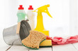 Bright colorful cleaning set on a wooden table