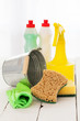 Bright colorful cleaning set on a wooden table