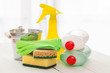 Bright colorful cleaning set on a wooden table