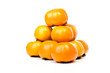 Persimmons in bright ripe pyramid
