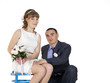 Portrait of Caucasian groom and Asian bride.