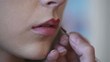 Video: Visagist putting lipstick on model's lips Visagist putting lipstick on model's lips