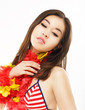 Femininity. Asian Woman with Colorful Origami Flowers