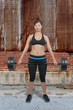 Photo: Asian Woman Working with Weights Asian Woman Working with Weights