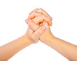 Women's hands with fingers interlaced