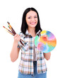 Beautiful young woman painter with brushes and palette,