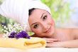 Beautiful young woman with towel
