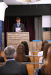 Business man is making a speech at conference room