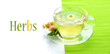 Cup of herbal tea with wild camomiles and mint, isolated