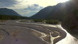 Aerial flight high over mountain river "Isar"