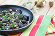 spring mushrooms in a frying pan