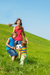 Laughing kids playing with a ball