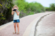 Little girl with camera